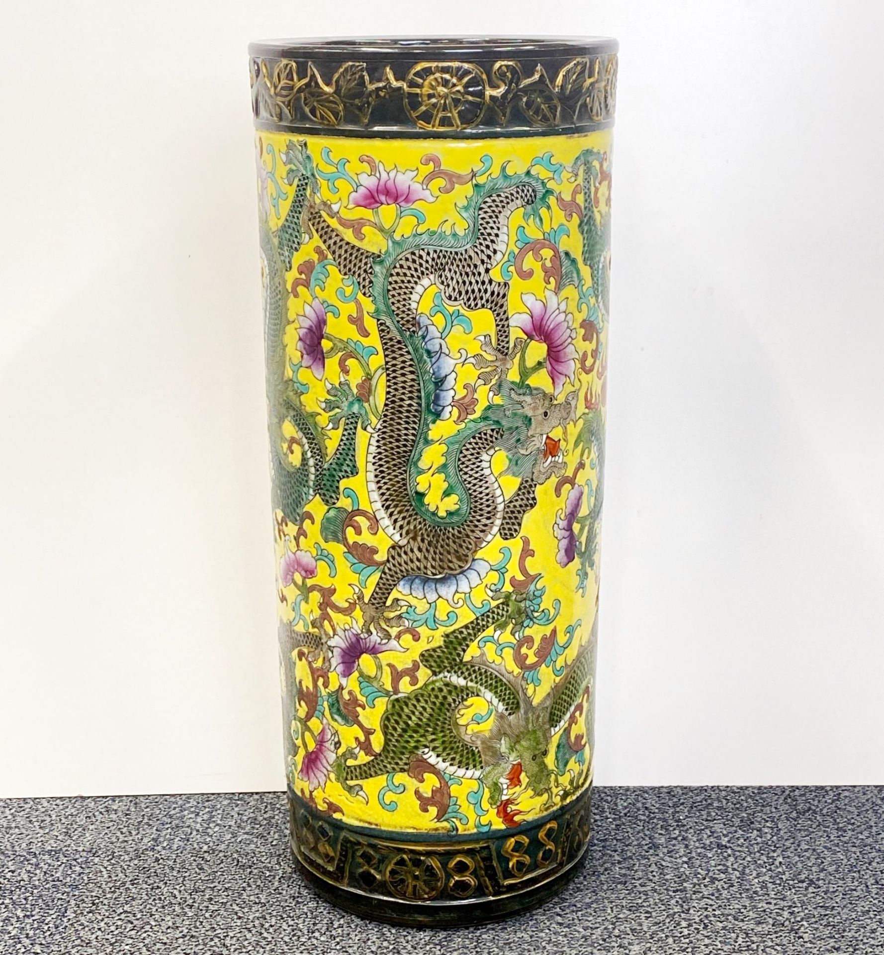 A Chinese hand enamelled porcelain umbrella stand, H. 61cm.