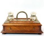 A brass mounted Victorian mahogany desk stand, W. 35cm.
