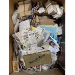 An extensive quantity of loose cigarette cards and albums.