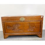 A Chinese camphorwood lined carved hardwood linen chest, 103 x 53 x 61cm.