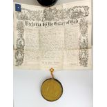 A metal cased 19th century Royal document seal attached to a Royal greeting from the Queen on