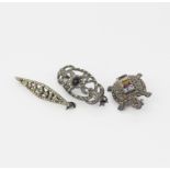Three silver and marcasite brooches, largest L. 4cm.