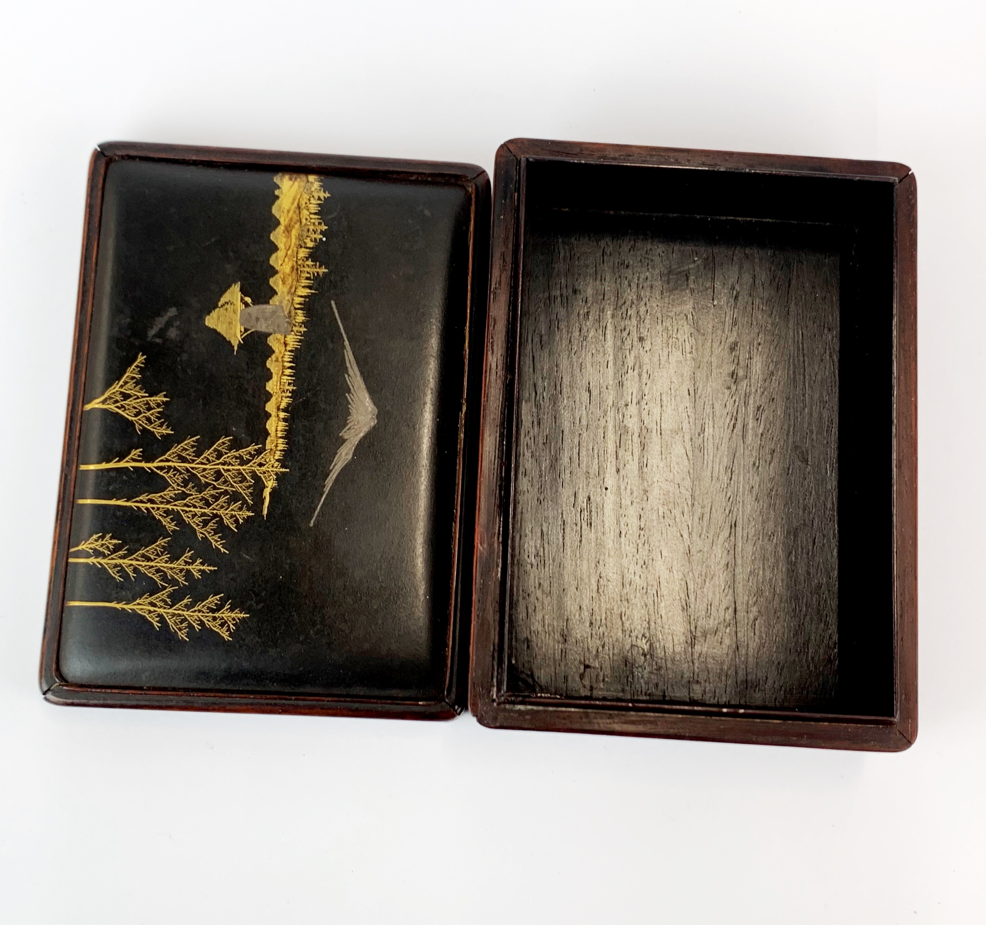 A Japanese hardwood cigarette box inset with a silvered and gilt bronze panel depicting Mount - Image 2 of 4