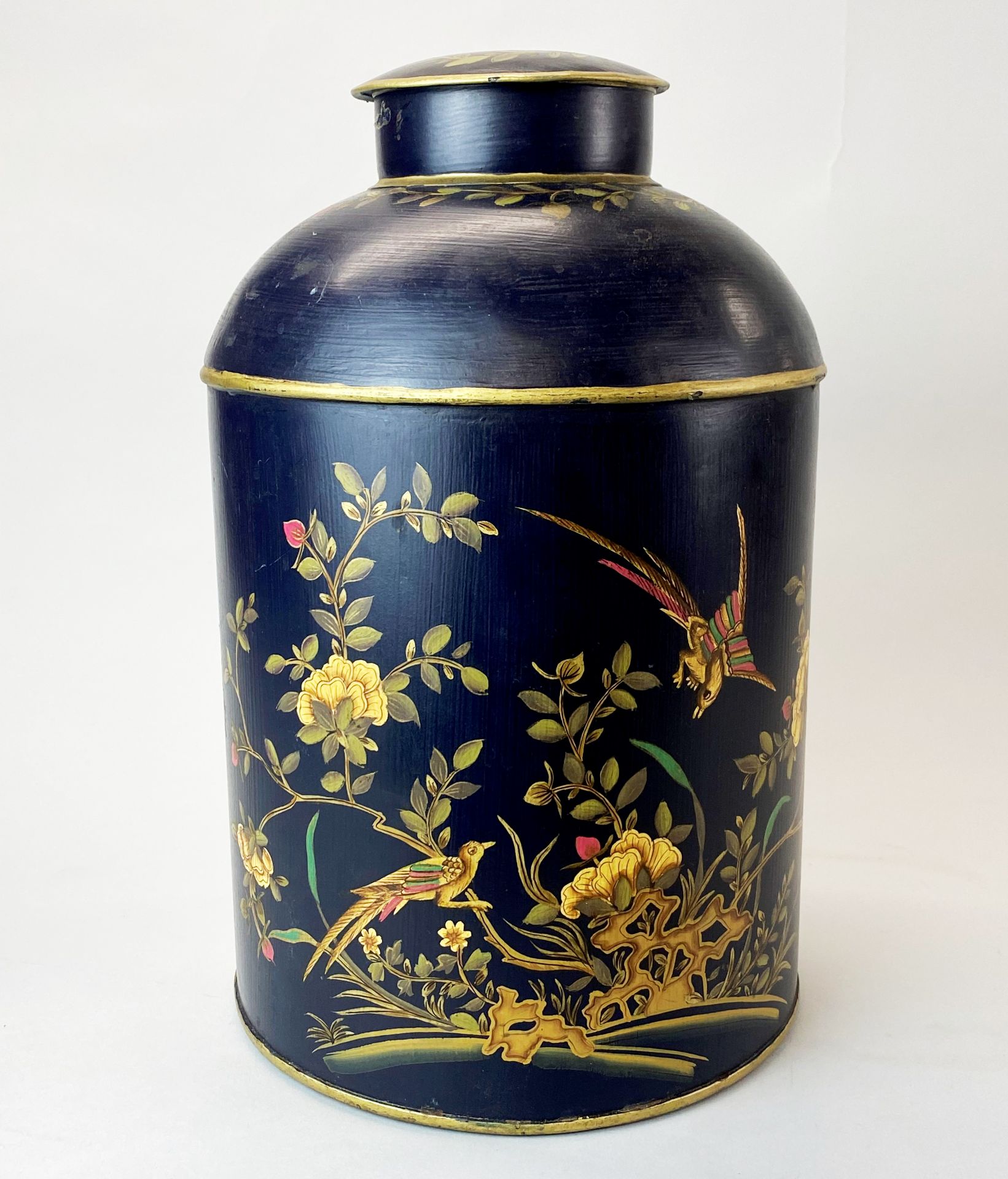 A large Toleware tea caddy, H. 36cm.