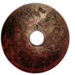 A Chinese carved stone Pi disc, dia. 30cm.