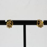 A pair of yellow metal (tested high carat gold, approx. 20ct) stud earrings with marked 22ct