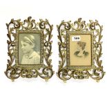 A pair of gilt brass Art Nouveau photograph frames, H. 28cm.