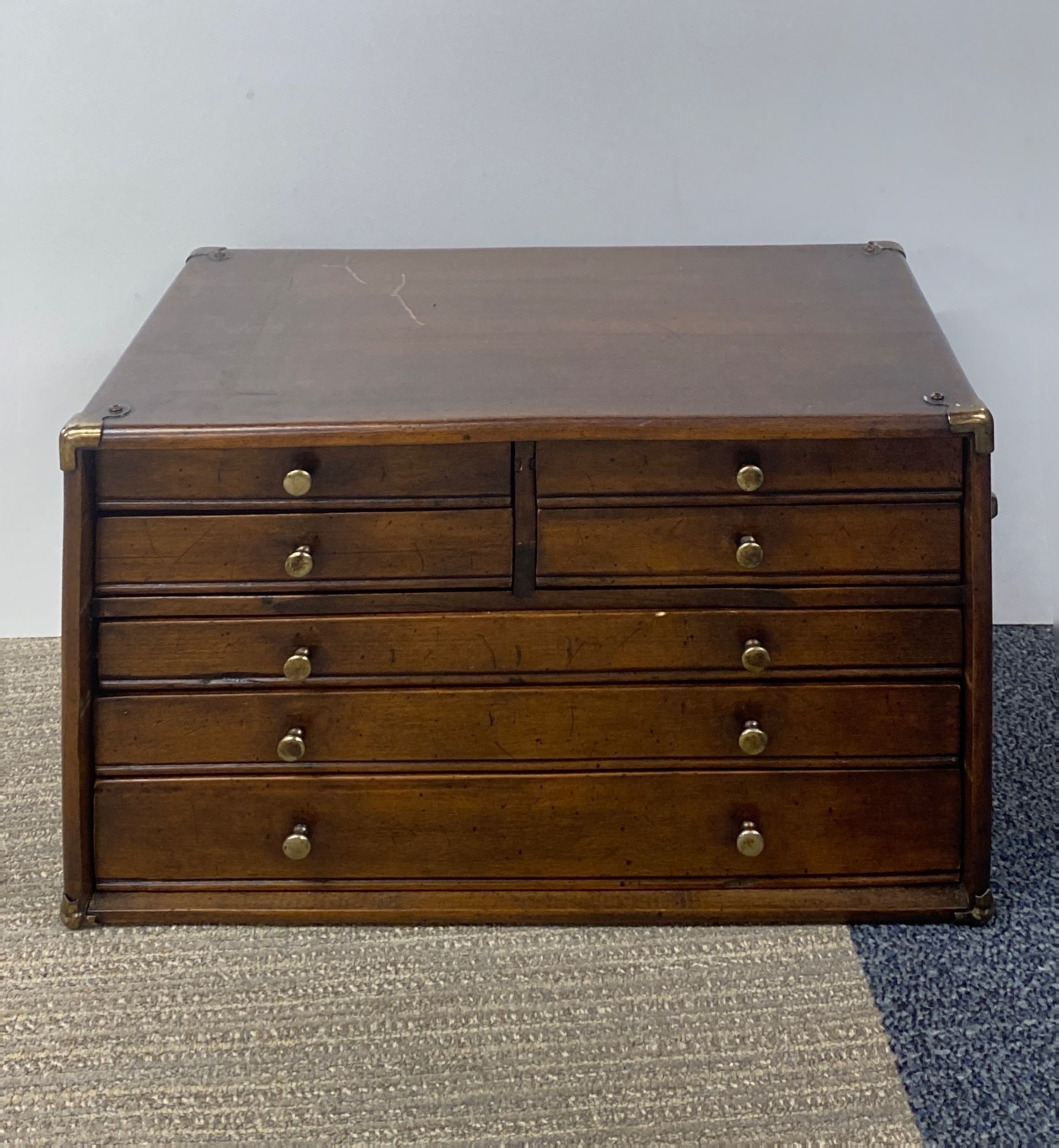 A seven drawer mahogany collector's chest, 47 x 29 x 28cm.