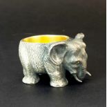 A small heavy Russian .84 silver gilt lined elephant salt, L. 5cm, H. 3cm.