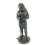 A signed 19th century Japanese bronze figure of a worker stopping to smoke a pipe, H. 31cm.