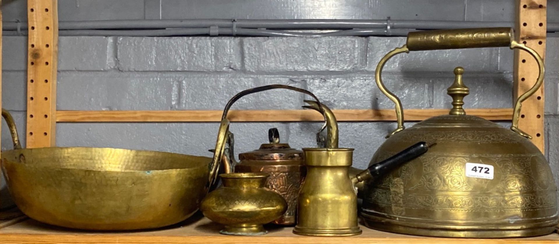 A large eastern brass kettle and other items, kettle W. 40cm.