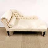 A contemporary button upholstered chaise style bedroom couch, L. 130cm.