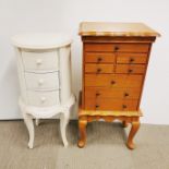 A circular three drawer white painted bedside cabinet, H. 75cm Dia. 36cm together with an eight