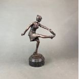 An Art Deco style resin figure of a dancer with a tambourine, H. 32cm.