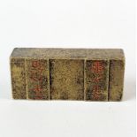 A Chinese gilt bronze/brass scroll weight or scholars seal, 8 x 3 x 2cm.