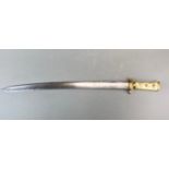 An early middle Eastern sword with engraved blade and later bone and brass hilt (18th century or
