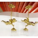 A pair of gilt brass and crystal cherub ceiling lights, H. 58cm.