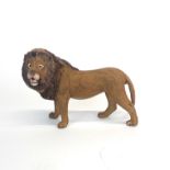 An Austrian cold painted bronze model of a lion, L. 9cm. H. 6.5cm.