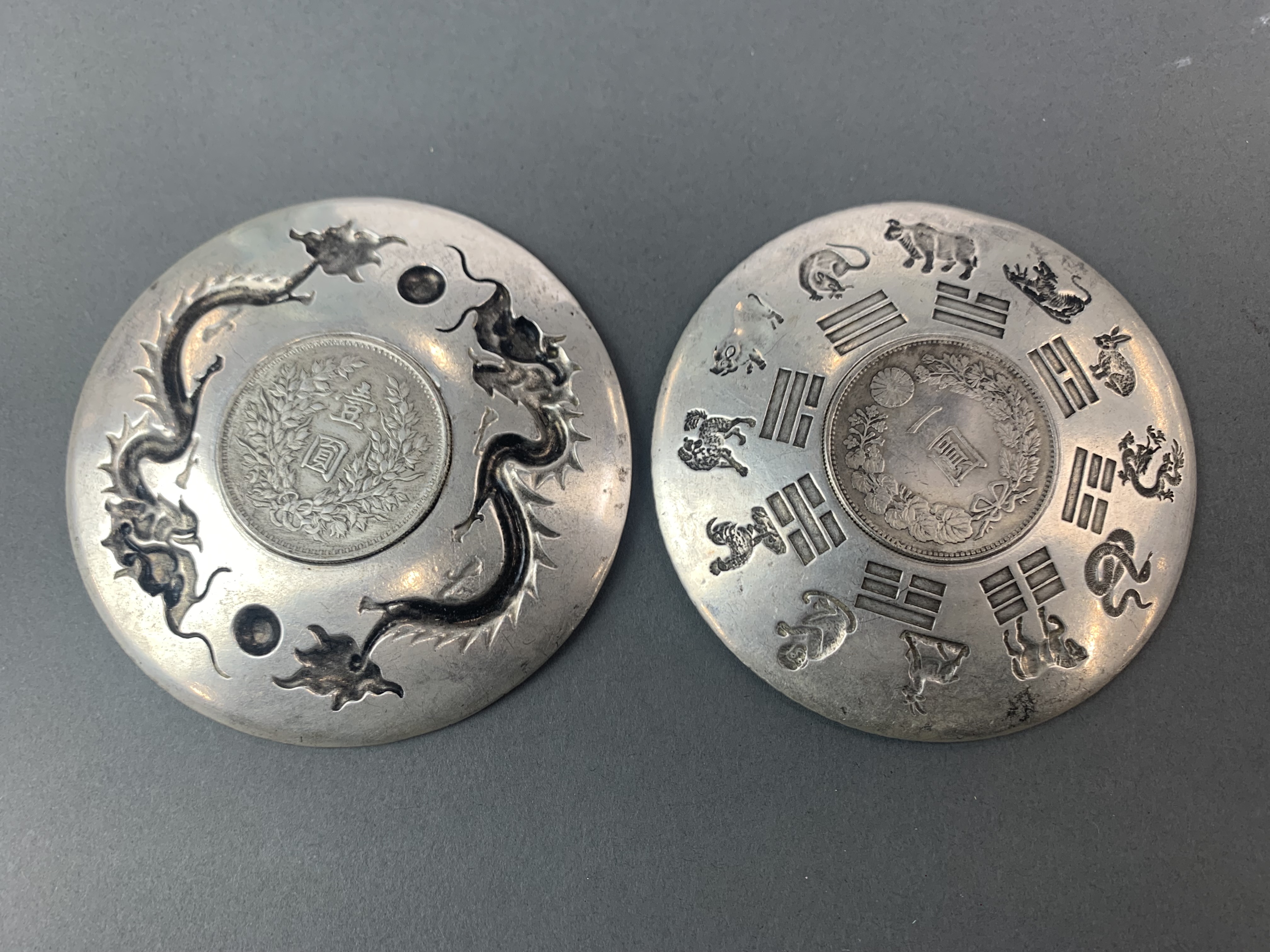 Two Chinese white metal dishes, Dia. 10cm. - Image 2 of 2