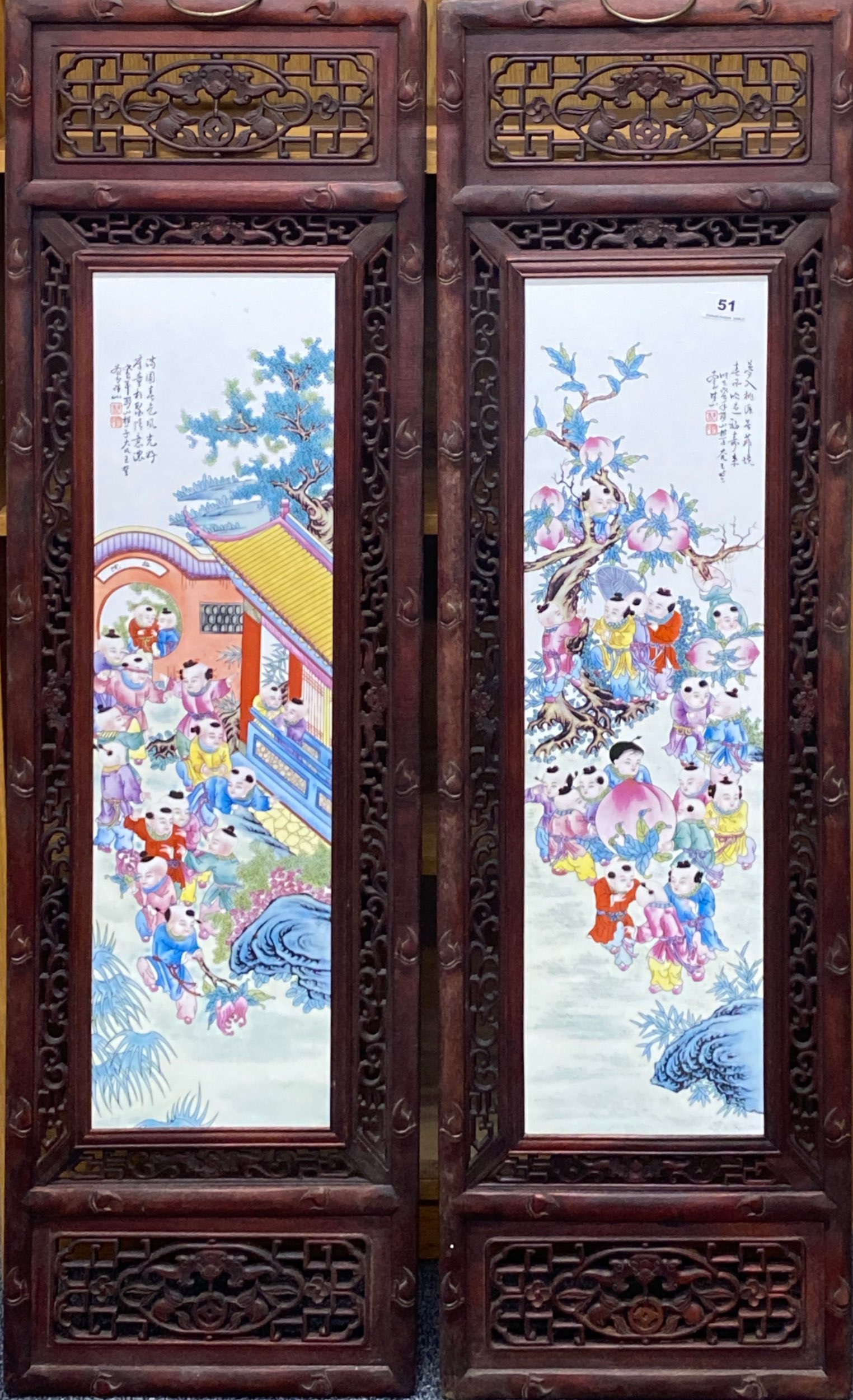 Two Chinese framed porcelain panels, frame size 120 x 36cm.