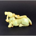 A Chinese celadon and russet jade model of a mythical horse and dragon, L. 8.5cm. H. 4.5cm.