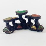 A Chinese bronze stone inset brush rest, W. 13cm, H. 6cm.