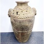 A large ornate pottery vase, H. 74cm.