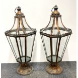 A pair of garden candle lanterns, H. 70cm.