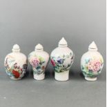A group of four Chinese and enamelled porcelain snuff bottles, tallest H. 8.5cm.