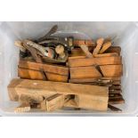 An extensive collection of wooden moulding planes and others.