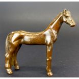 A lovely cast bronze model of a race horse, H. 7cm. L. 7.5cm.