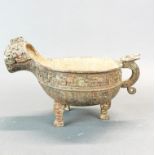 A Chinese Archaic form bronze jug shaped vessel, L. 26cm. H. 17cm.