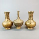 An engraved Persian brass vase, H. 24cm. together with a pair of enamelled and engraved brass