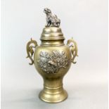 An early 20th Century Chinese bronze/brass censer with lion dog handles, H. 29cm.