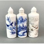 A group of three Chinese porcelain snuff bottles, H. 10cm.