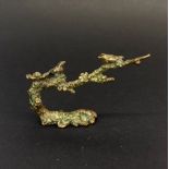 A small bronze figure of two birds on a branch (probably Japanese), W. 8.5cm. H. 5cm.