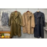 An R.A.F woollen coat together with an Army woollen trench coat and a woollen duffle coat with two