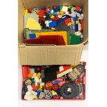 A box of mixed Lego items.