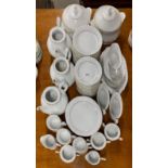 An extensive white and gold porcelain tea and dinner service.