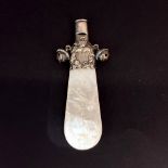 A child's sterling silver and mother of pearl baby teething whistle/rattle, L. 10.5cm.