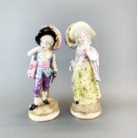 A pair of Continental porcelain figures of children, H. 36cm.
