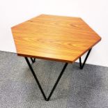 A Prada stained teak and metal hexagonal side table with a brass 'Prada Milano' plaque, 52 x 39cm.