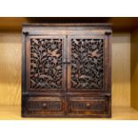 A small 19th Century carved wooden cabinet, 36 x 37 x 18cm. Slightly A/F to top left side panel.