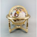A brass mounted globe inset with semi-precious stones, Dia. 31cm.