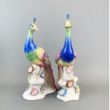 A pair of Continental porcelain figures of birds, H. 30cm.