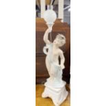 A large ceramic cherub floor lamp, H. 121cm.