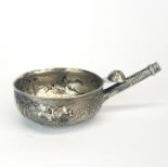 An early Victorian hallmarked silver toddy ladle bowl with embossed decoration of a Steeple chase