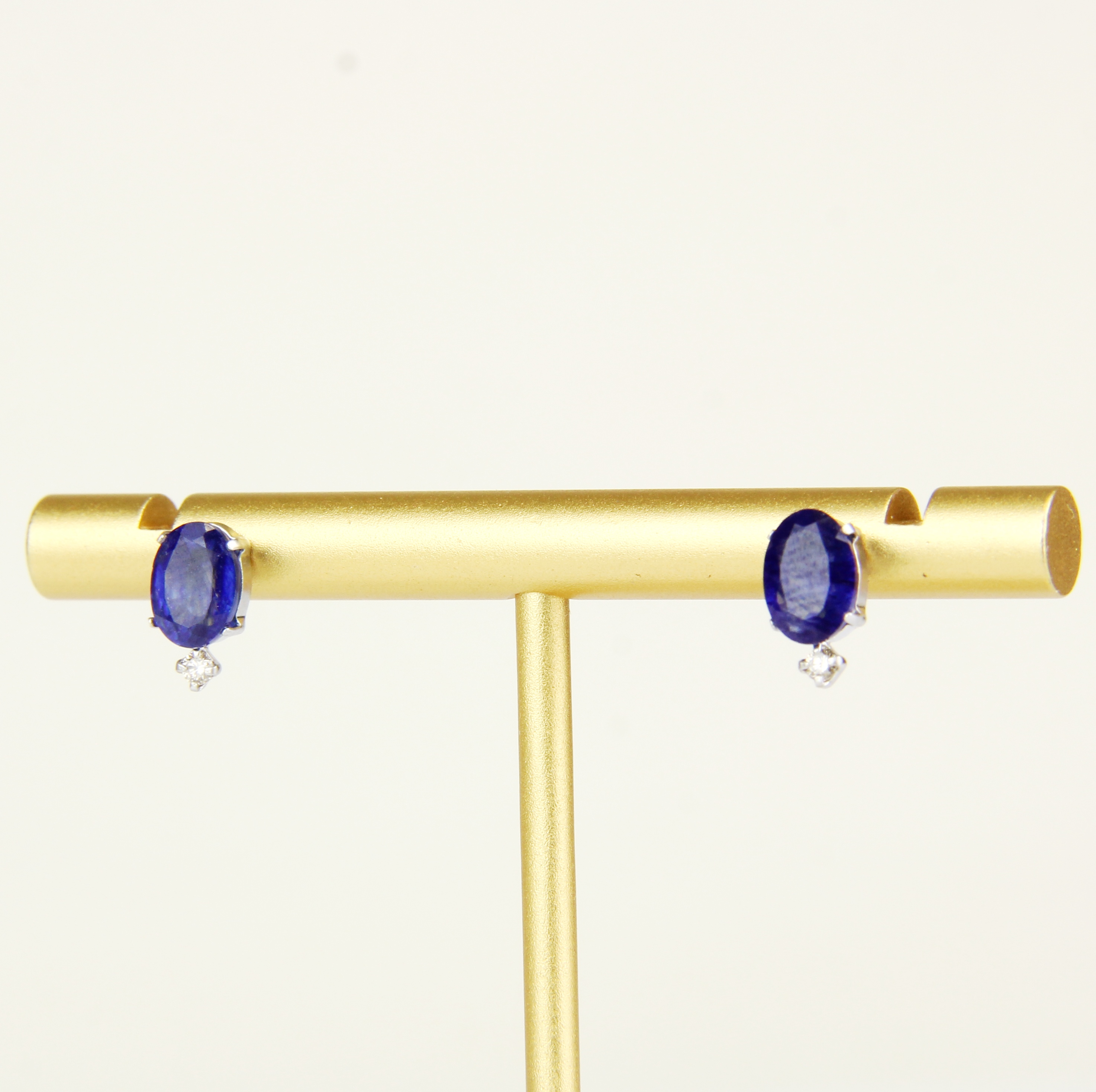 A pair of 18ct white gold sapphire and brilliant cut diamond set stud earrings, L. 1cm. With plastic - Image 2 of 3