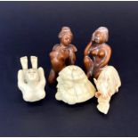 A group of Japanese carved fruitwood and bone netsuke, tallest 5cm.