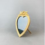 A lovely gilt brass heart-shaped photo frame, H. 19cm.